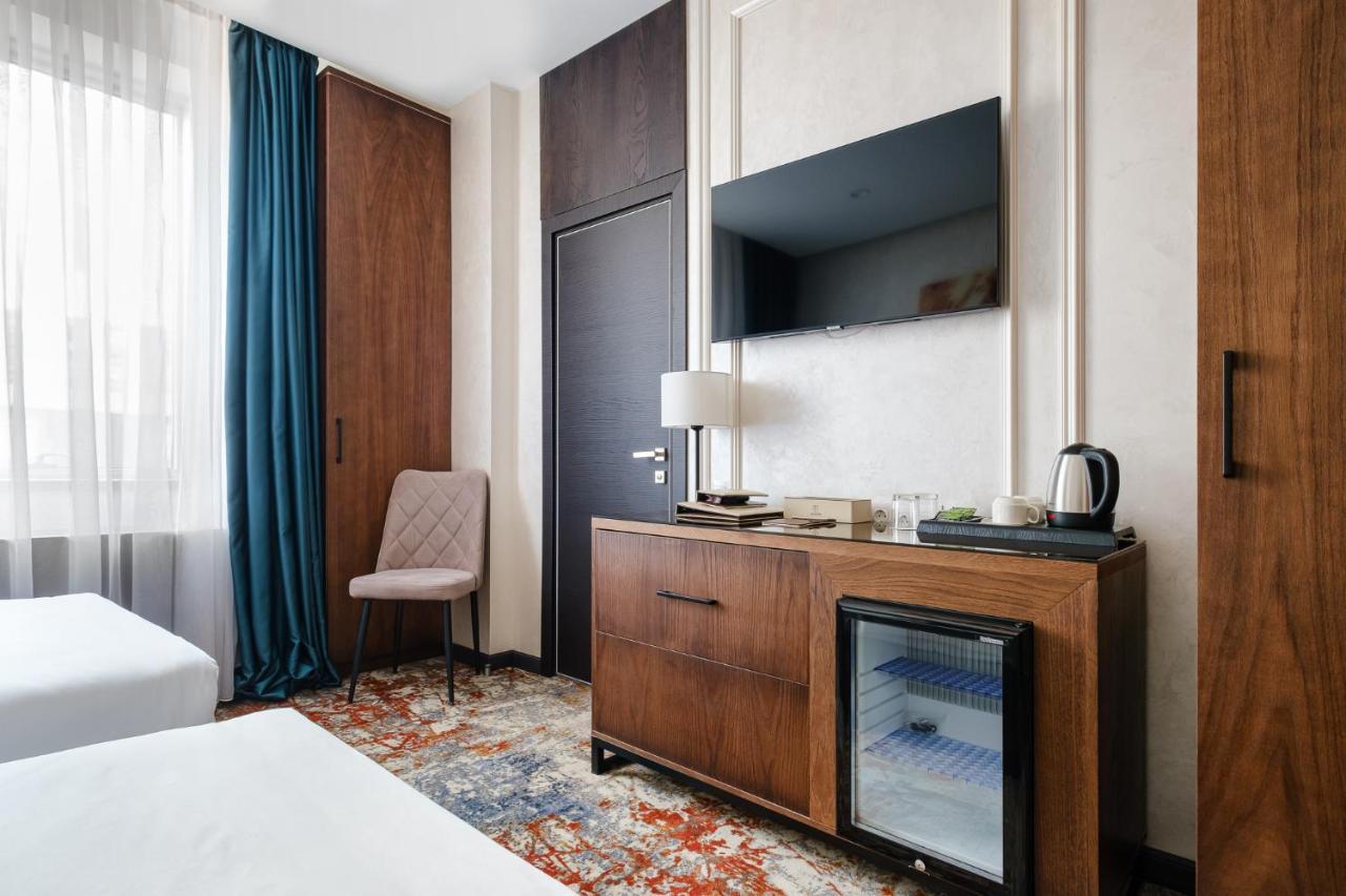 Grand Mildom Hotel Alma-Ata Buitenkant foto
